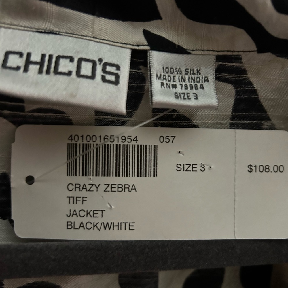 Chicos size 3 which is like a 16/18, light weight jacket.
